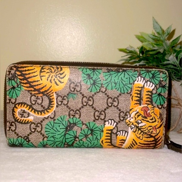 Gucci Handbags - Gucci GG Limited Edition Bengal Tiger
Zipper Wallet